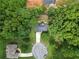 Aerial view of a house featuring a large backyard, surrounding trees, and cul-de-sac location at 262 Devynwood Ln, Dallas, GA 30157