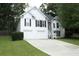 Charming two-story home featuring a two-car garage, well-maintained lawn, and beautiful exterior at 262 Devynwood Ln, Dallas, GA 30157