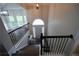 Home foyer showcasing stairway, chandelier, and hardwood floors at 262 Devynwood Ln, Dallas, GA 30157