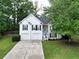 Charming two-story home with a well-manicured lawn, two-car garage, and inviting front porch at 262 Devynwood Ln, Dallas, GA 30157
