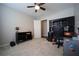 Spacious office with a ceiling fan, a large desk, and a comfortable chair, perfect for working from home at 262 Devynwood Ln, Dallas, GA 30157
