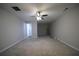 Open living room with neutral carpet, and a ceiling fan at 262 Devynwood Ln, Dallas, GA 30157