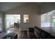 Open concept living room with hardwood floors flows into dining area and kitchen at 262 Devynwood Ln, Dallas, GA 30157