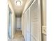 Hallway showcasing a series of large closets and access to adjoining rooms at 4363 Stonewall Tell Rd, Atlanta, GA 30349