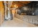 Unfinished basement with concrete floors, exposed ductwork, and potential for customization at 7000 Woodland Nw Pl, Kennesaw, GA 30152