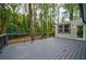 Spacious outdoor deck perfect for entertaining and enjoying the wooded surroundings at 1329 Hidden Hills Pkwy, Stone Mountain, GA 30088