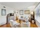 Bright living room showcasing hardwood floors, modern decor, and a large window with natural light at 162 Lablanc Nw Way, Atlanta, GA 30327