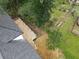 Aerial view showcasing a new deck and surrounding yard with mature trees at 2764 Midway Rd, Decatur, GA 30030