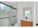 Stylish bathroom featuring a glass-enclosed shower and modern vanity at 2764 Midway Rd, Decatur, GA 30030