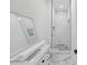 Sleek bathroom design with marble tile, walk-in shower, and modern vanity at 2764 Midway Rd, Decatur, GA 30030