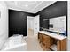 Under-construction bathroom with custom lighting, and double sink vanity at 2764 Midway Rd, Decatur, GA 30030