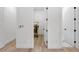 Bright hallway with hardwood floors and white trim throughout the house at 2764 Midway Rd, Decatur, GA 30030
