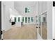 Bright, open-concept living space with soaring ceilings and hardwood floors at 2764 Midway Rd, Decatur, GA 30030