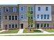 Charming townhomes with brick and siding accents and well-manicured lawns at 2973 Beaconwood Ct, Lawrenceville, GA 30043