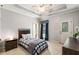 Comfortable bedroom with bed, nightstand, and plenty of natural light at 5173 Brendlynn Dr, Suwanee, GA 30024