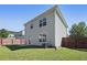 Exterior view of the back of the house featuring the siding and windows at 139 Palmetto St, Locust Grove, GA 30248