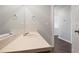 Bathroom vanity featuring neutral countertop and large mirror at 139 Palmetto St, Locust Grove, GA 30248