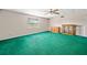 Spacious finished basement with green carpeting and bright window at 2623 Lone Oak Nw Trl, Kennesaw, GA 30144