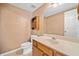 Bathroom features a vanity with sink, wooden cabinets, and neutral walls at 2623 Lone Oak Nw Trl, Kennesaw, GA 30144