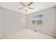 Bedroom with neutral carpet, a ceiling fan, and a bright window at 2623 Lone Oak Nw Trl, Kennesaw, GA 30144