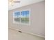 Neutral bedroom with bright window and plush carpeting at 2623 Lone Oak Nw Trl, Kennesaw, GA 30144
