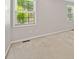 Bright bedroom with neutral carpet and two windows offering natural light at 2623 Lone Oak Nw Trl, Kennesaw, GA 30144
