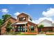 The Southern Museum of Civil War and Locomotive History with red brick and green trim at 2623 Lone Oak Nw Trl, Kennesaw, GA 30144