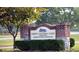 The Swift-Cantrell Park entrance sign with stone and brick masonry and manicured landscaping at 2623 Lone Oak Nw Trl, Kennesaw, GA 30144