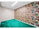 A room with light carpet and bookshelf-themed wallpaper at 2623 Lone Oak Nw Trl, Kennesaw, GA 30144