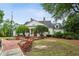 Charming home with a brick walkway, well-manicured landscaping, and a welcoming facade at 107 W Point Trl, Woodstock, GA 30189