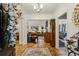 Spacious foyer featuring tile flooring, views to formal living and dining areas, and neutral decor at 107 W Point Trl, Woodstock, GA 30189