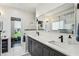 Main bathroom features double sinks, modern fixtures, and a glass-enclosed shower at 107 W Point Trl, Woodstock, GA 30189