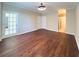 Spacious bedroom with hardwood floors, neutral walls, and an ensuite bathroom, ideal for relaxation and privacy at 2499 Peachtree Rd # 506, Atlanta, GA 30305