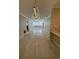 Spacious living room with modern lighting fixture and large windows at 2499 Peachtree Rd # 506, Atlanta, GA 30305