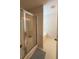Bathroom featuring a shower, bathtub, and tile flooring at 5421 Skylar Creek Ln, Buford, GA 30518