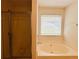 Bathroom featuring a bathtub and a shower at 5421 Skylar Creek Ln, Buford, GA 30518
