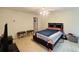 Comfortable bedroom with ceiling fan and neutral carpeting at 5421 Skylar Creek Ln, Buford, GA 30518