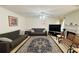 Spacious living room with fireplace, carpet, and comfortable furnishings, ideal for relaxing at 5421 Skylar Creek Ln, Buford, GA 30518