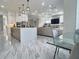 Open-concept living, dining, and kitchen area great for entertaining and Gathering gatherings at 1952 Azalea Dr, Lawrenceville, GA 30043