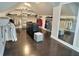Spacious walk-in closet with hardwood floors, shelves and clothing racks at 1952 Azalea Dr, Lawrenceville, GA 30043