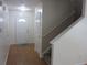 Welcoming entryway with hardwood flooring and a staircase leading to the upper level at 215 Silver Spring St, Dallas, GA 30157