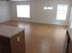 Spacious living room area featuring wood floors, recessed lighting, and natural light, perfect for gatherings at 215 Silver Spring St, Dallas, GA 30157
