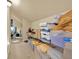 Finished attic with storage shelving and office area in the background at 4995 Aviary Nw Dr, Acworth, GA 30101