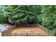 Spacious fenced backyard with mulched area perfect for outdoor play and relaxation at 4995 Aviary Nw Dr, Acworth, GA 30101