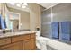 Full bathroom with a shower-tub combo, tile floor, and wooden vanity at 4995 Aviary Nw Dr, Acworth, GA 30101