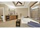 Open bathroom featuring a large soaking tub, vanity, and tile flooring at 4995 Aviary Nw Dr, Acworth, GA 30101