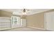 Bedroom with built-in shelves and window seat, perfect for reading and relaxation at 4995 Aviary Nw Dr, Acworth, GA 30101