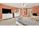 Spacious primary bedroom with carpet, ceiling fan, and windows for natural light at 4995 Aviary Nw Dr, Acworth, GA 30101
