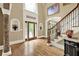 Grand foyer with high ceilings, elegant staircase, and decorative details at 4995 Aviary Nw Dr, Acworth, GA 30101