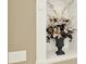 Foyer niche decorated with a floral arrangement at 4995 Aviary Nw Dr, Acworth, GA 30101